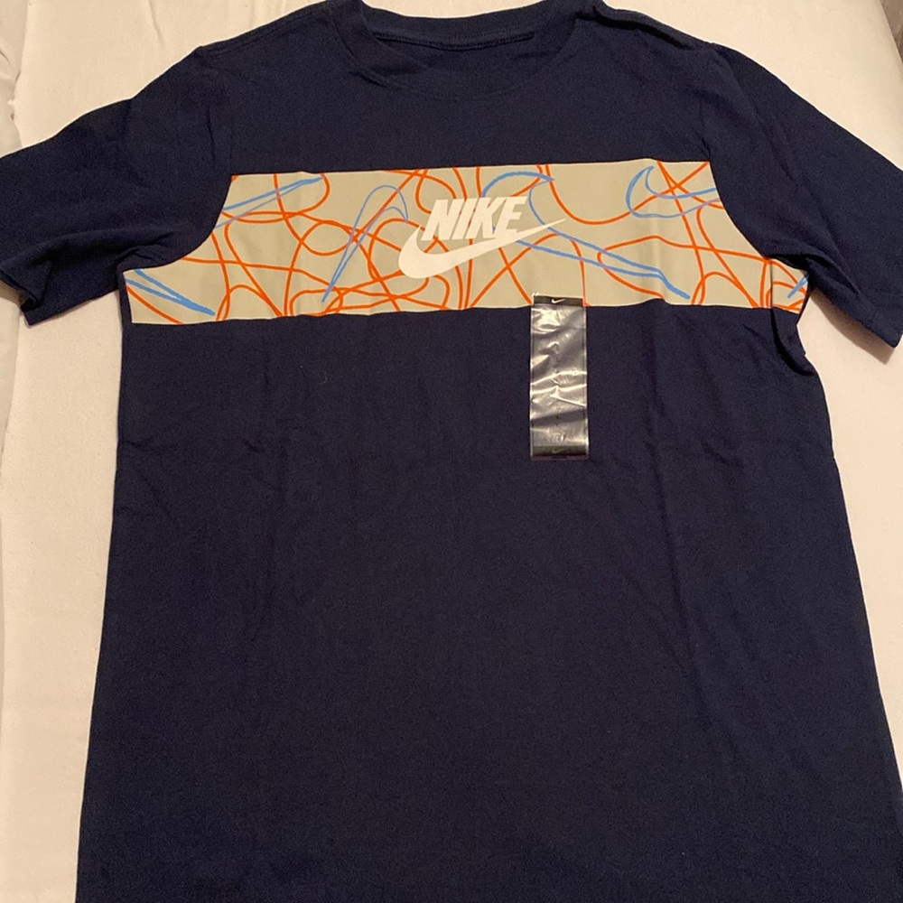 Boys Nike size L tee.